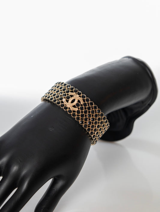 CHANEL wide bracelet bangle gold with black rhinestones CC