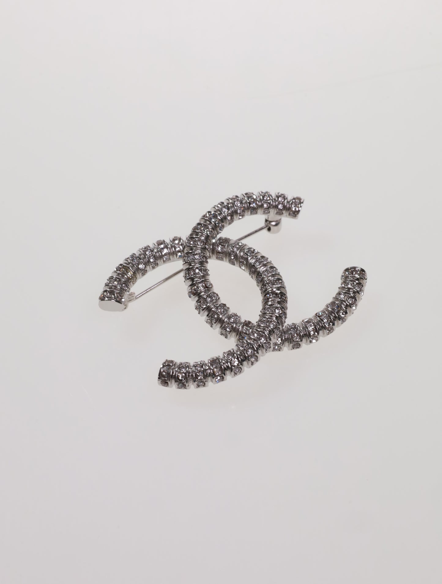 CHANEL brooch large CC in rhinestones and silver