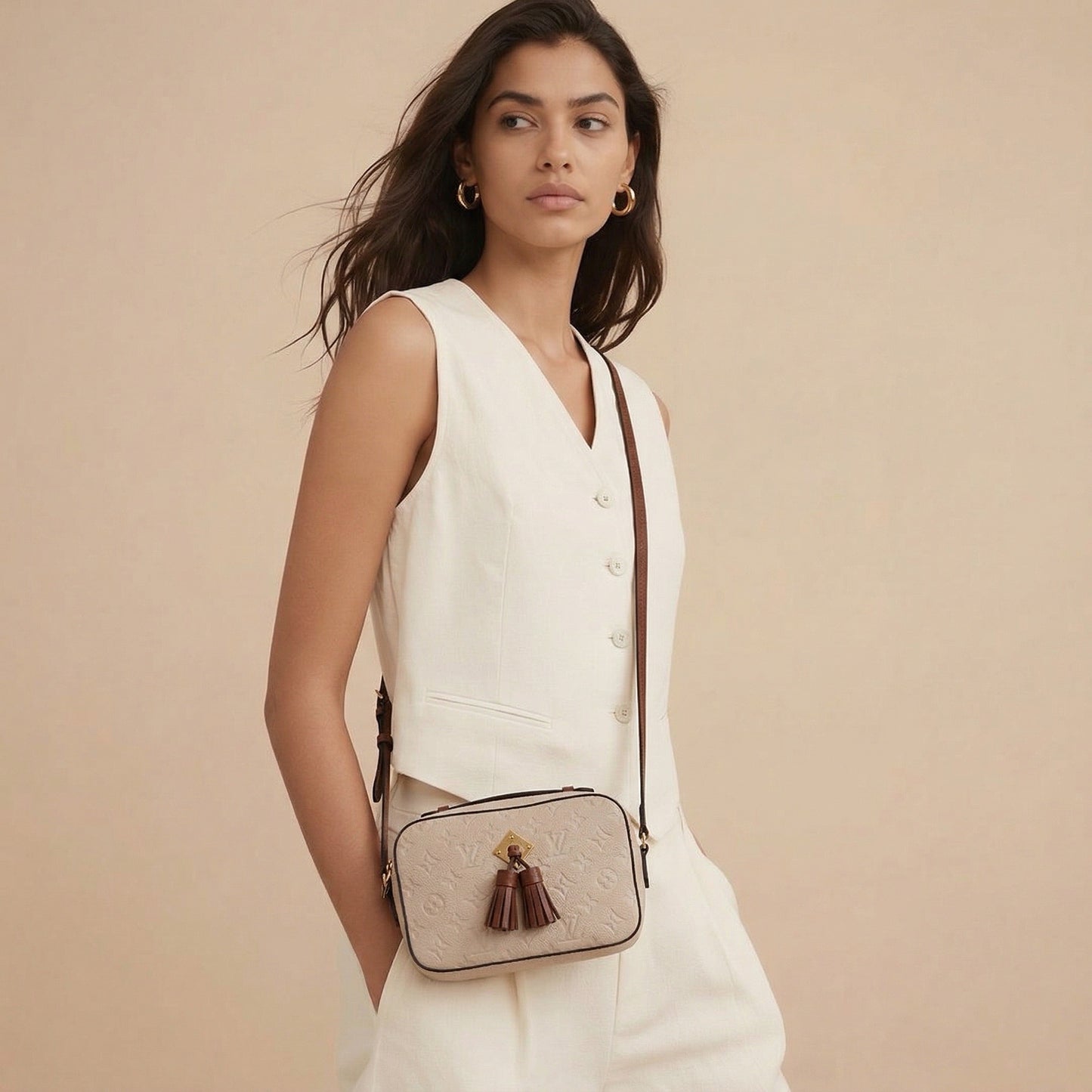 LOUIS VUITTON Saintonge Empreinte Creme Monogram neuwertig