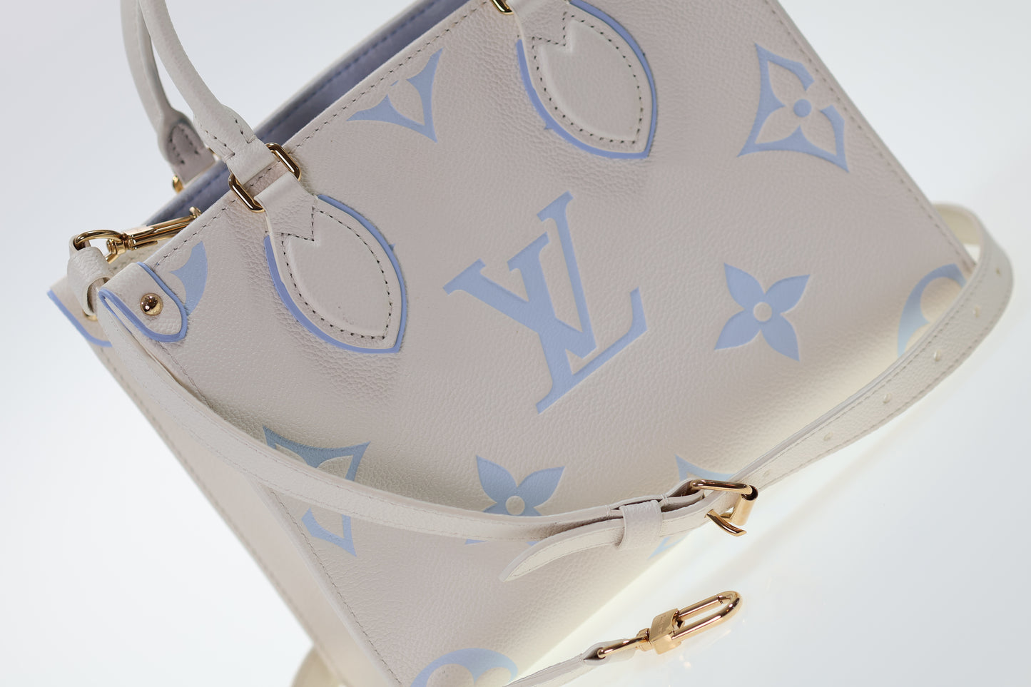 LOUIS VUITTON OnTheGo PM Empreinte Creme / Blue Giant Monogram