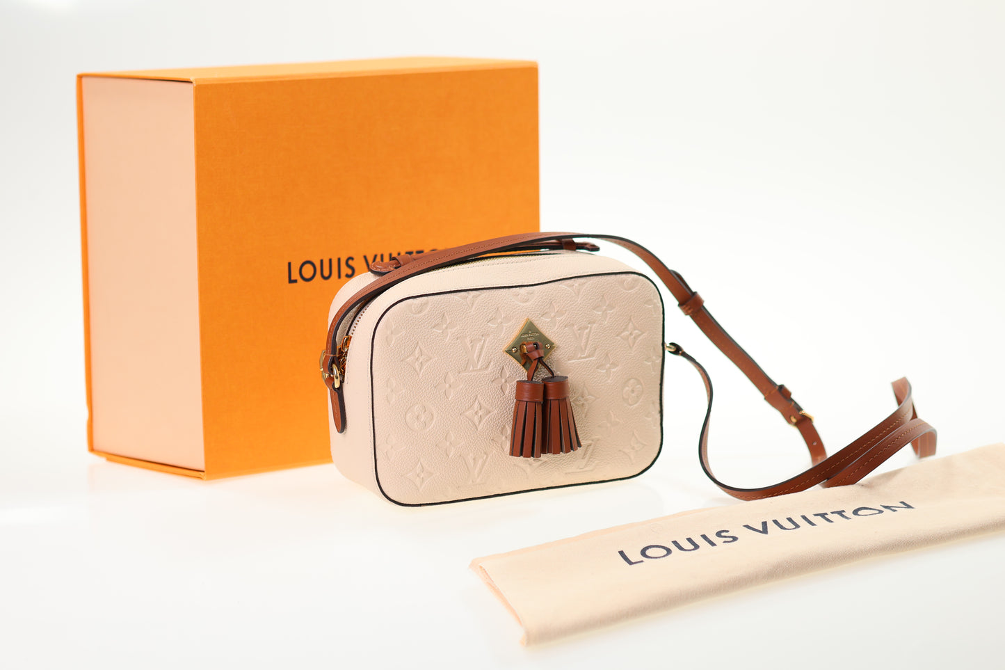 LOUIS VUITTON Saintonge Empreinte Creme Monogram neuwertig