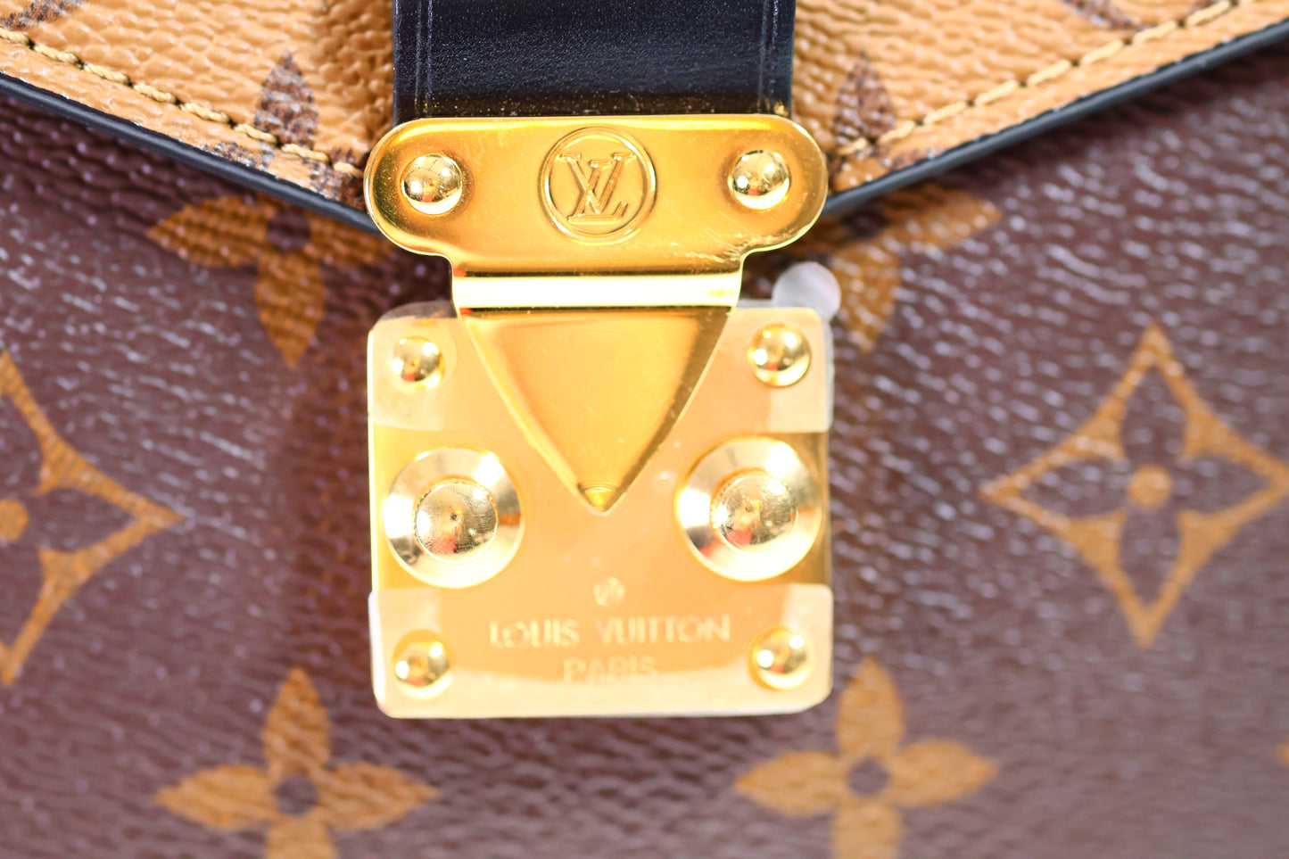 Borsa a tracolla LOUIS VUITTON Metis Monogram Infrarouge Nero-Rosso