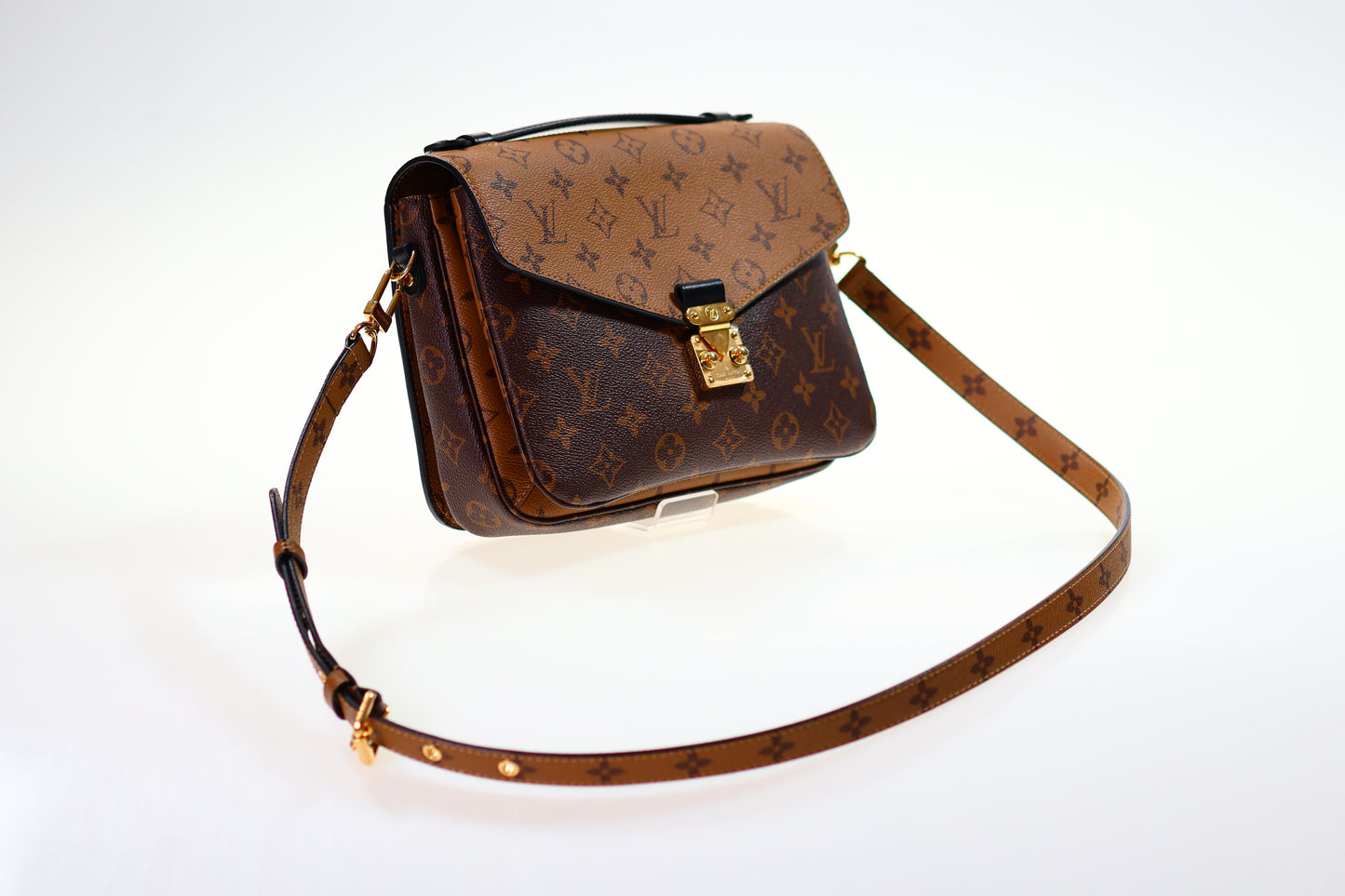 Borsa a tracolla LOUIS VUITTON Metis Monogram Infrarouge Nero-Rosso