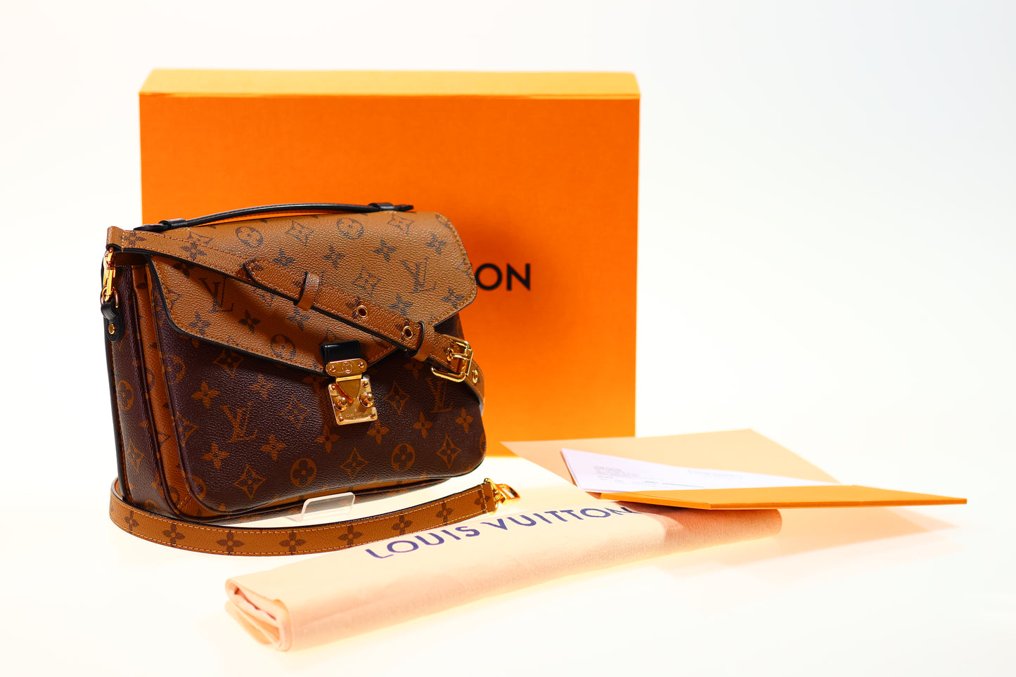 Borsa a tracolla LOUIS VUITTON Metis Monogram Infrarouge Nero-Rosso